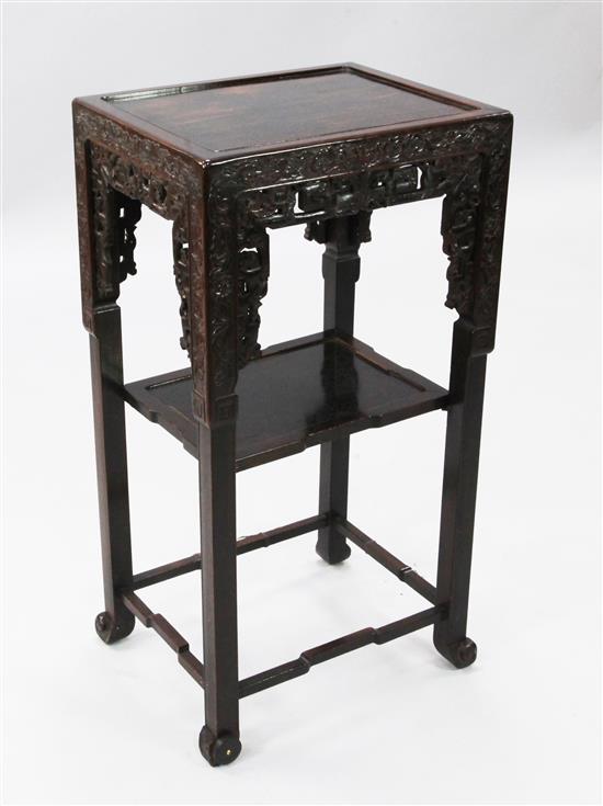 An early 20th century Chinese hardwood two tier occasional table, W.1ft 4in. D.1ft 1in. H.2ft 7in.